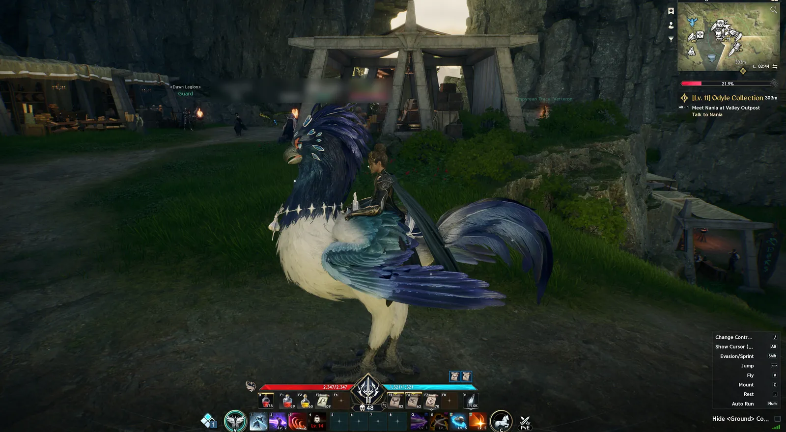 A Daeva riding a large blue-and-white feathered pet mount through the Dawn Legion Base at dusk, with the quest tracker showing Odyle Collection and the controls panel in the corner.